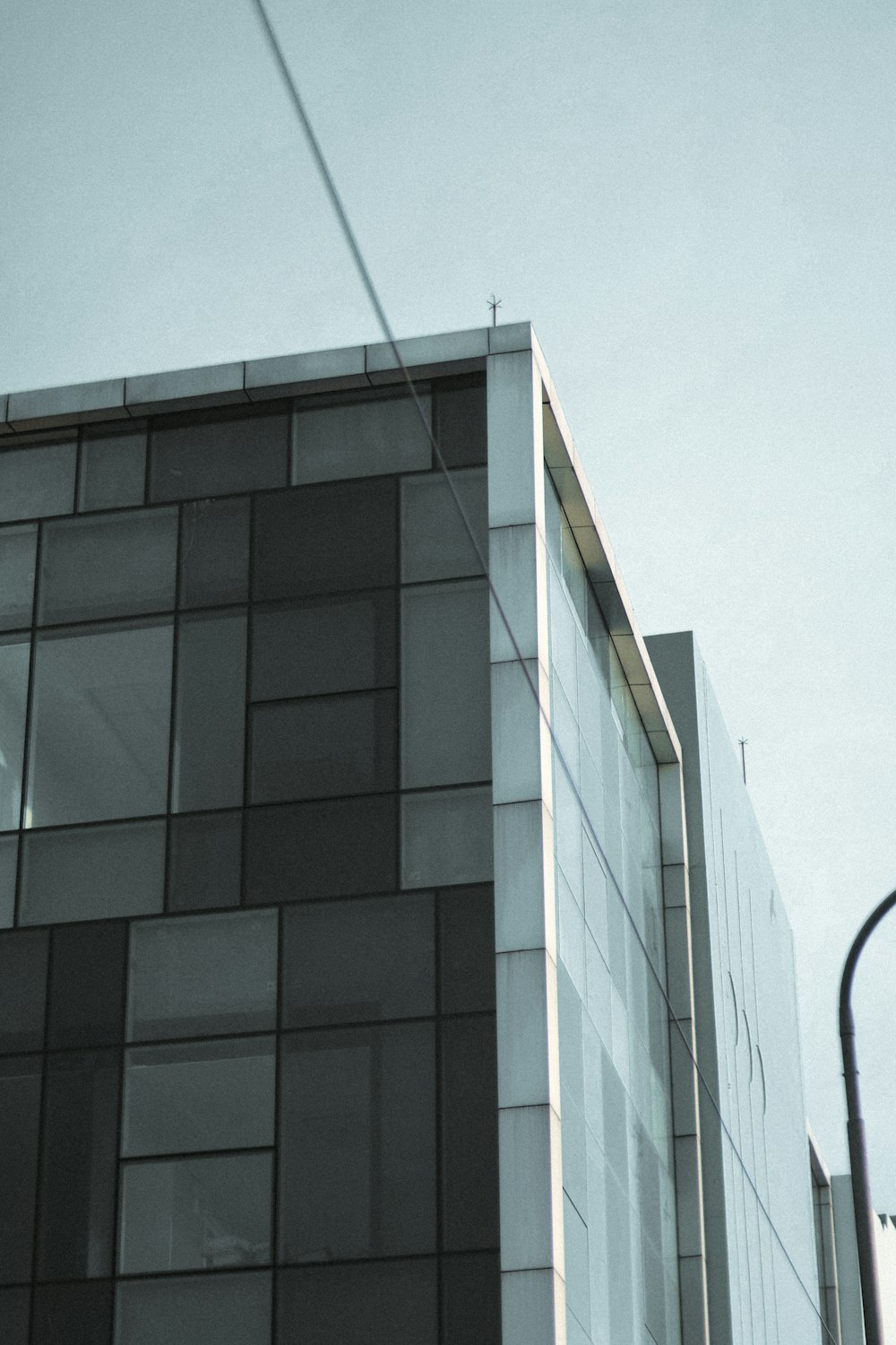 a tall building sitting next to a traffic light