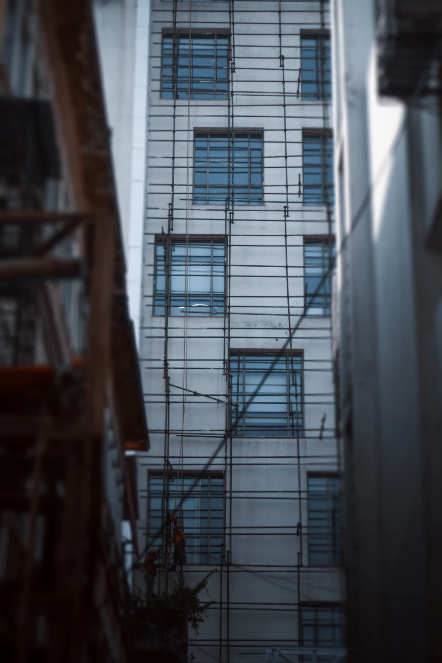 High-rise building clad in scaffolding