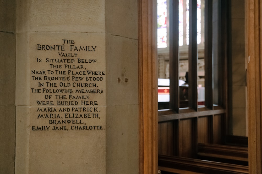 a plaque on the wall of a building