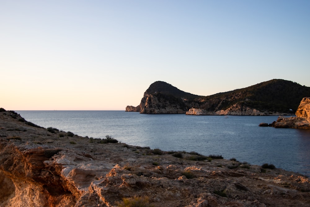 a large body of water surrounded by mountains