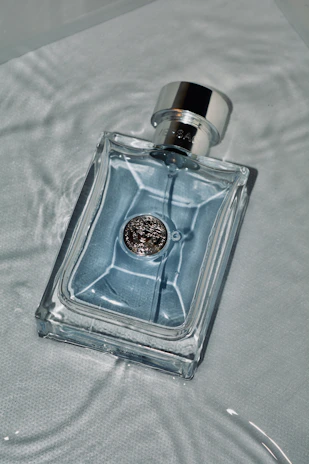 A sleek bottle of Moonmist liquid gargle resting on a wooden shelf with soft morning light.