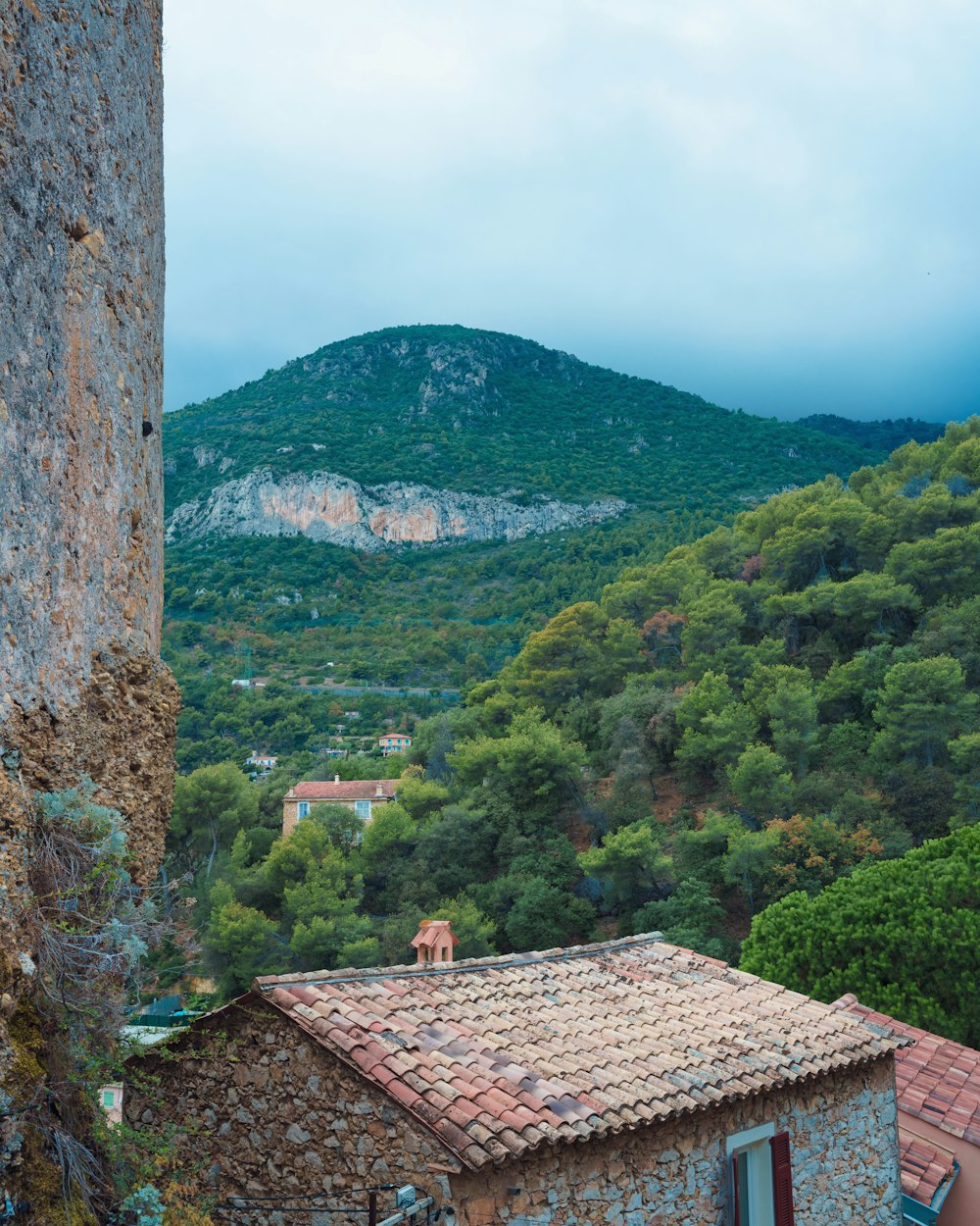 a view of a small village in the mountains