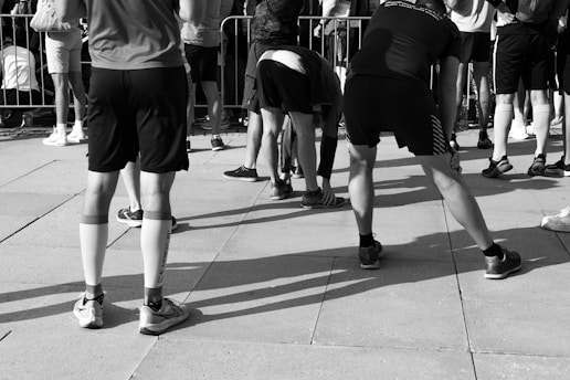 a group of people standing in front of a crowd