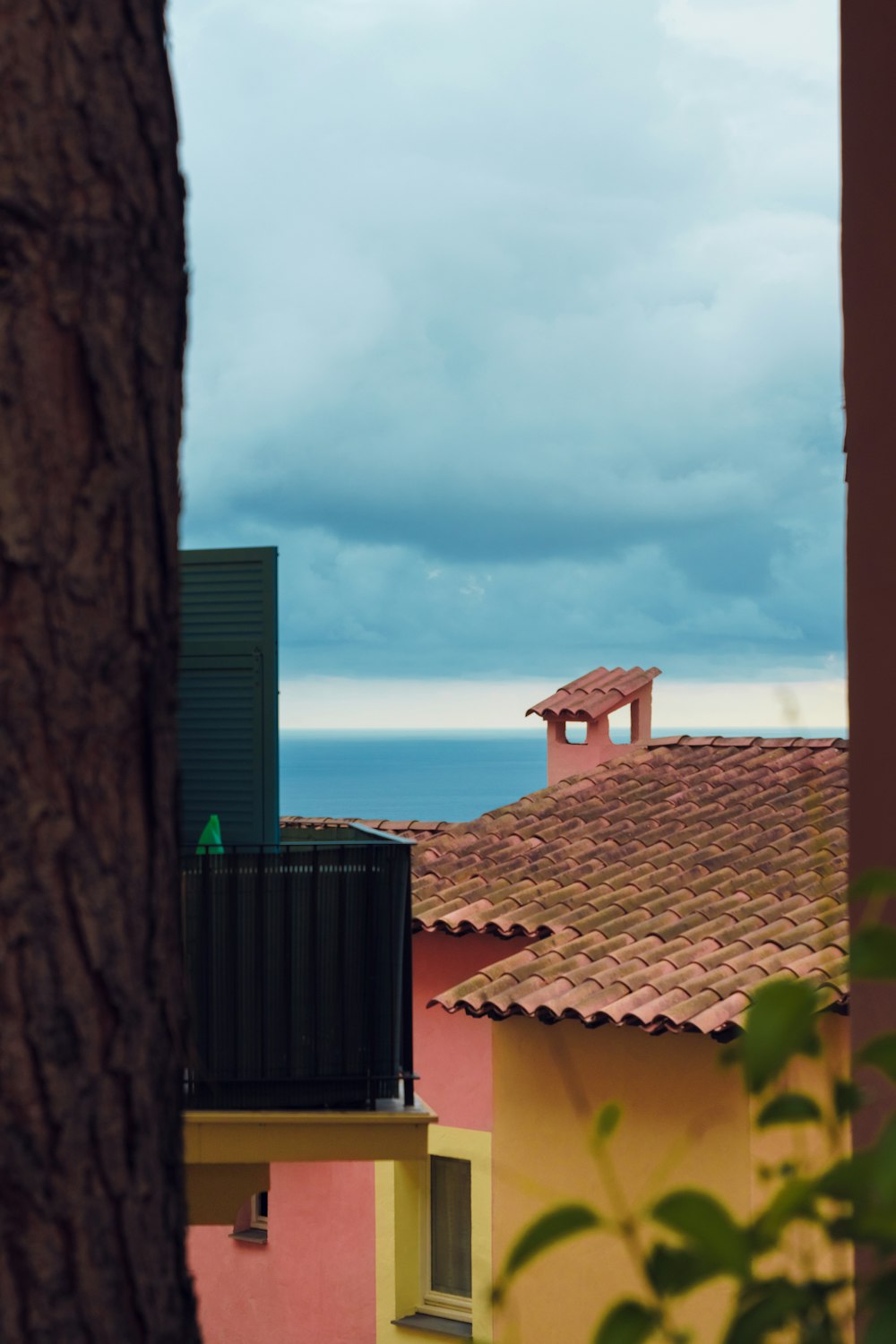 a view of the ocean from a window in a building