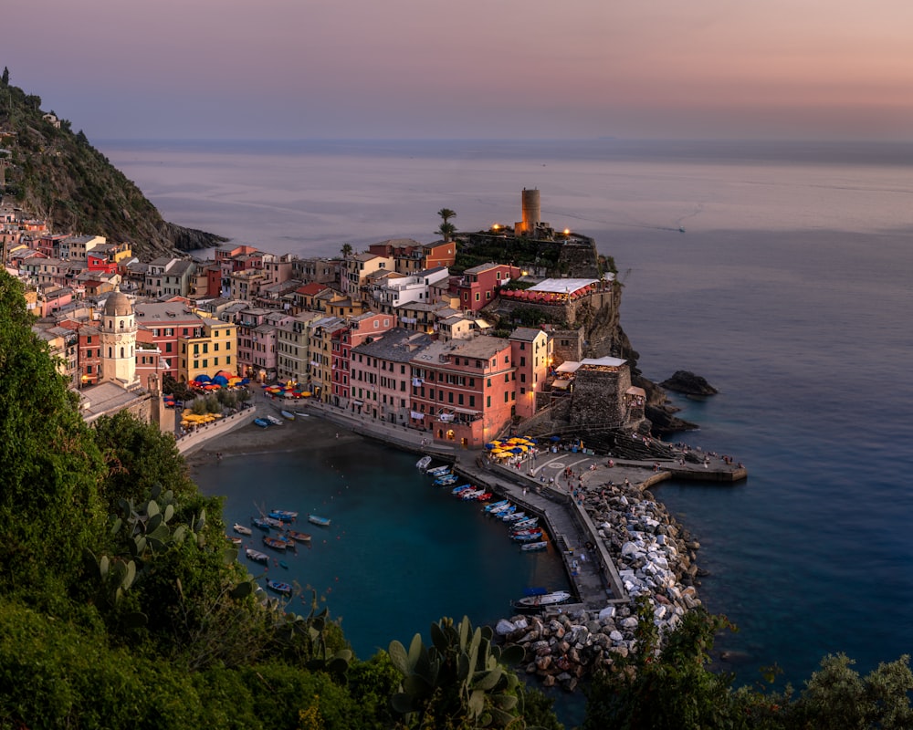 a town on a cliff overlooking the ocean