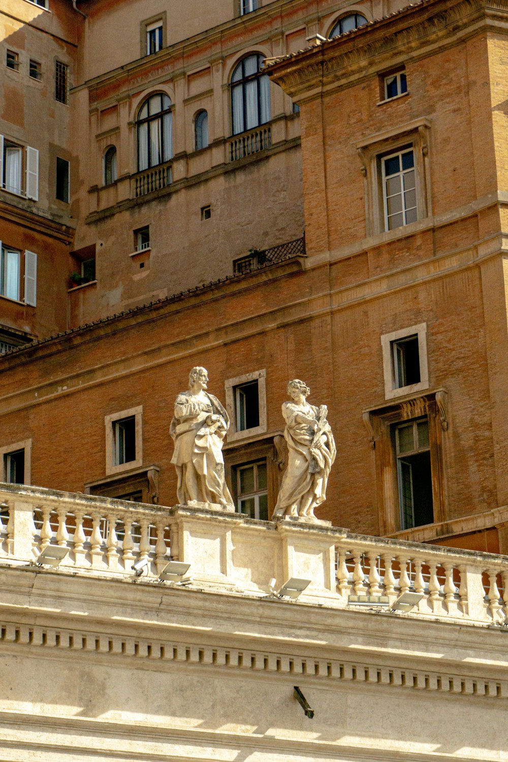 a building with statues on the top of it