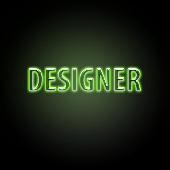 Neon green text with the word 'DESIGNER' on a dark background, glowing brightly with a soft green hue around the letters.
