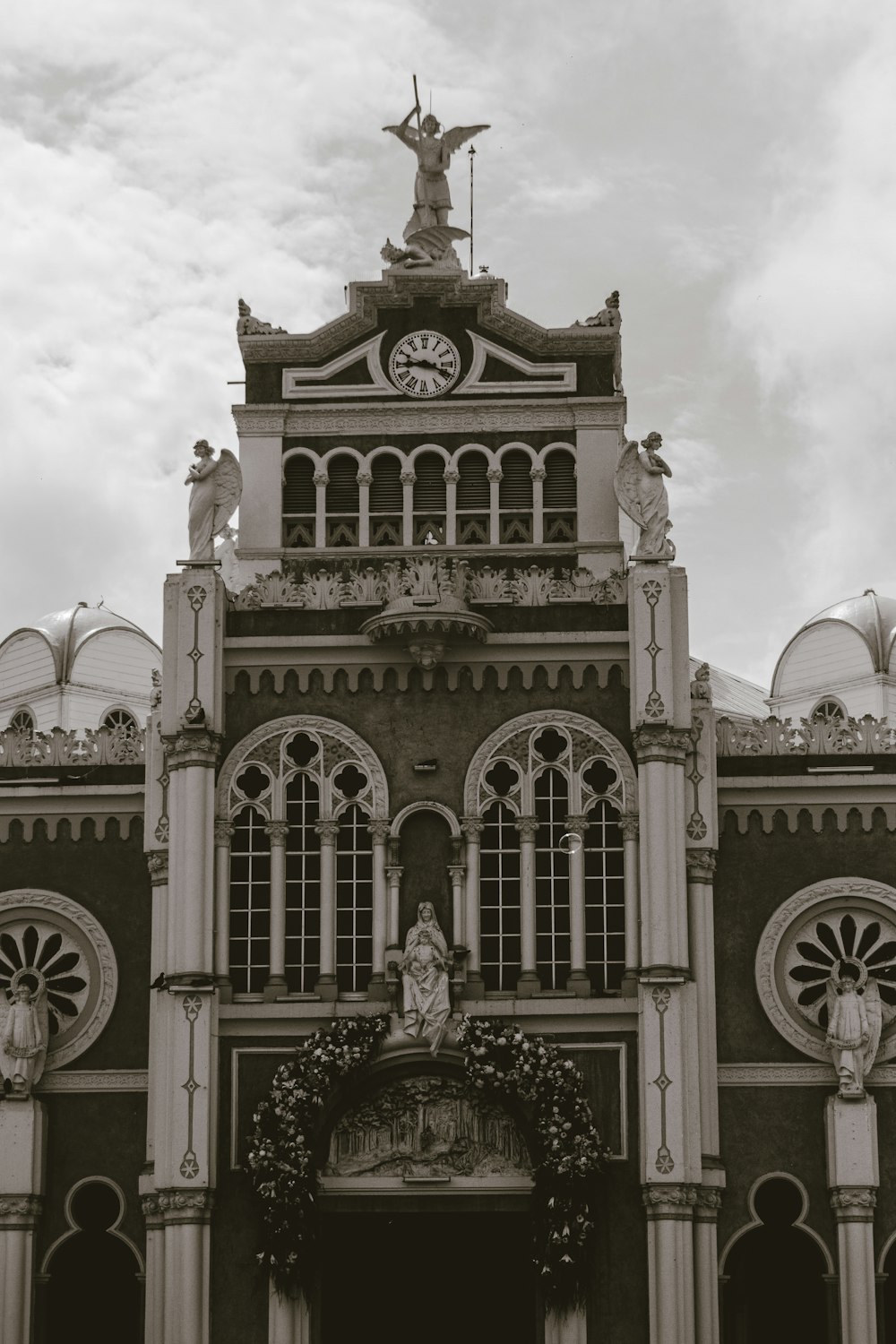 a black and white photo of a large building