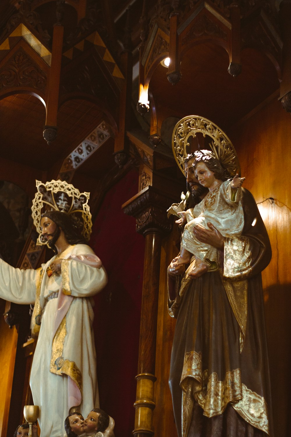 a statue of mary and jesus in a church