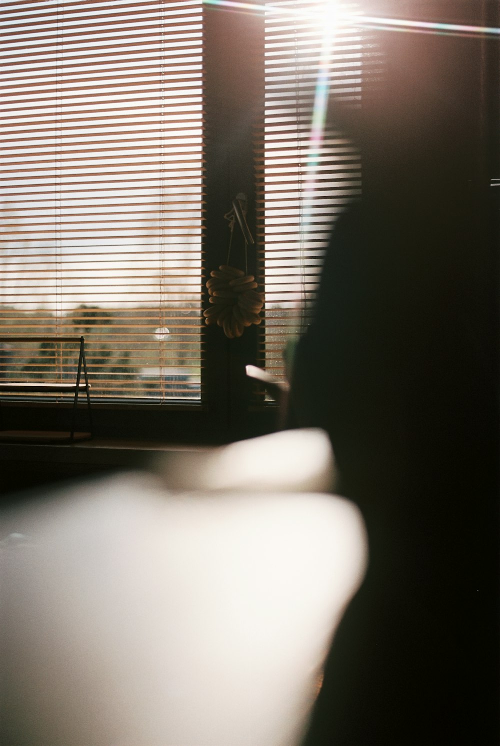 a white bath tub sitting in a bathroom next to a window