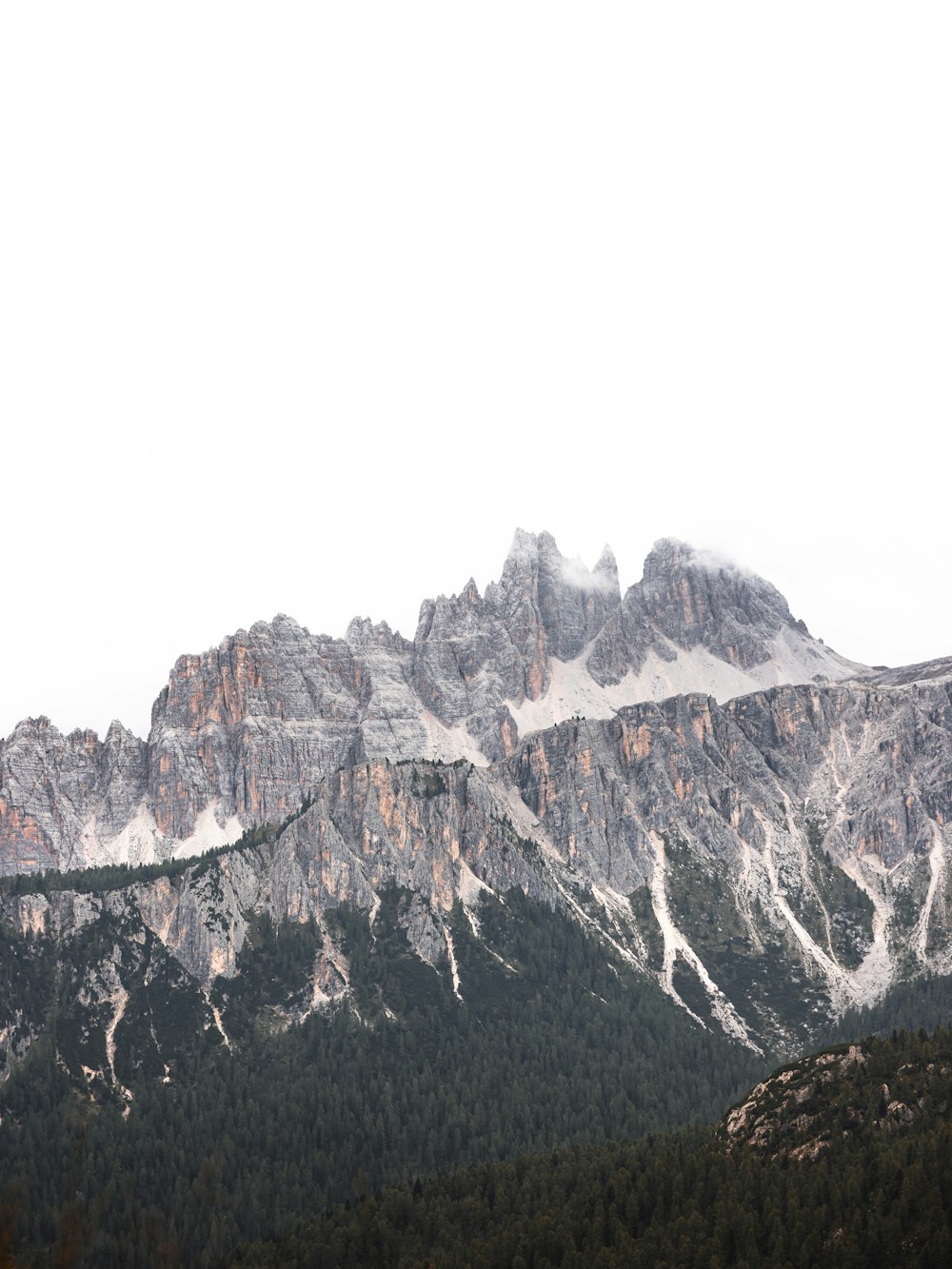 a mountain range with snow on the top of it