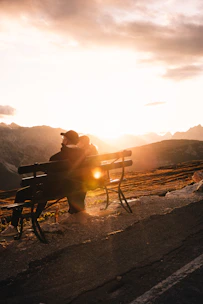 A cozy couple enjoying a sunset view over the serene mountains of Neelum Valley.