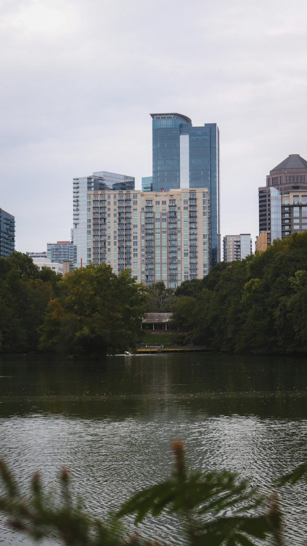 a body of water surrounded by tall buildings