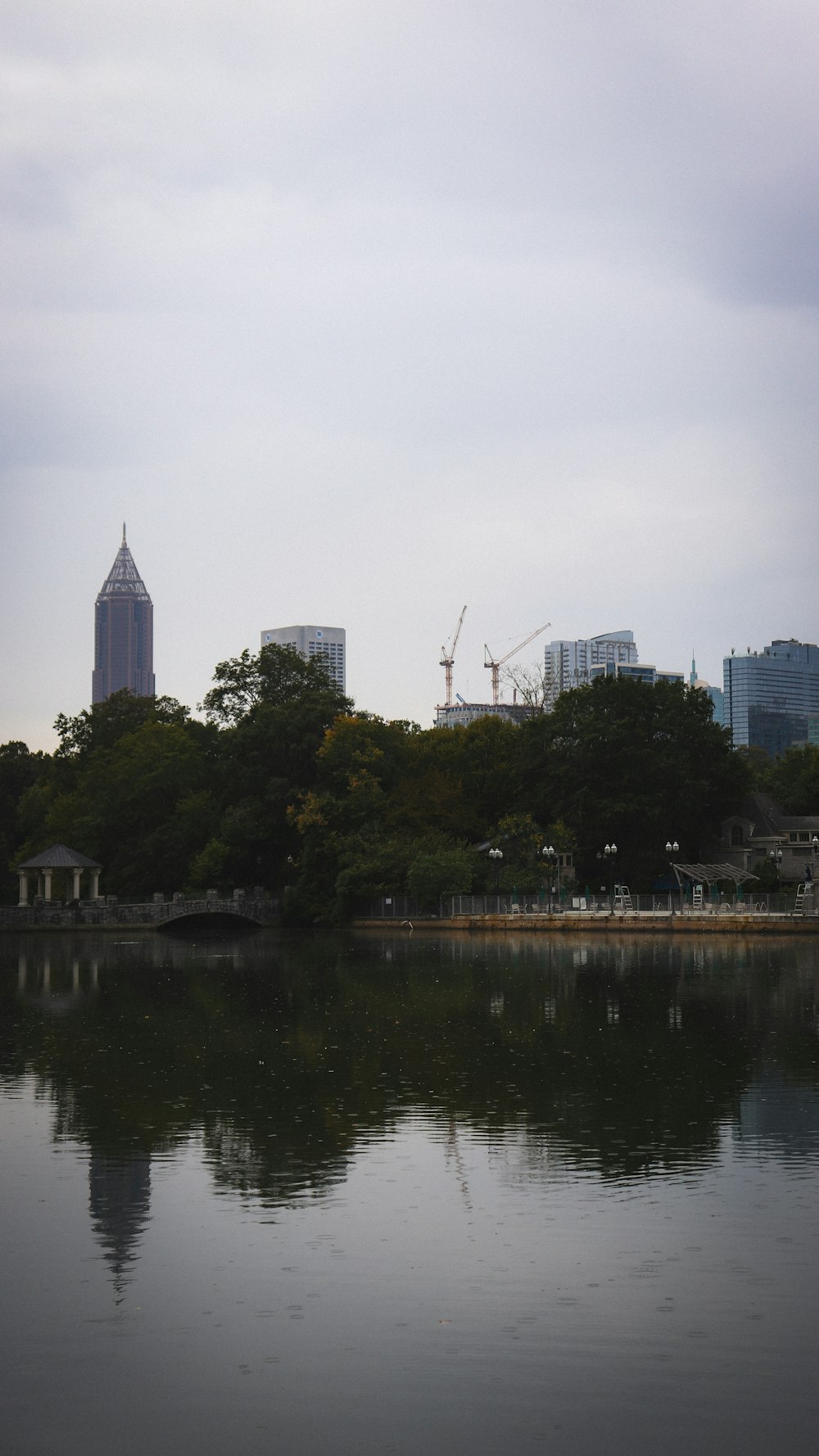 a body of water with a city in the background