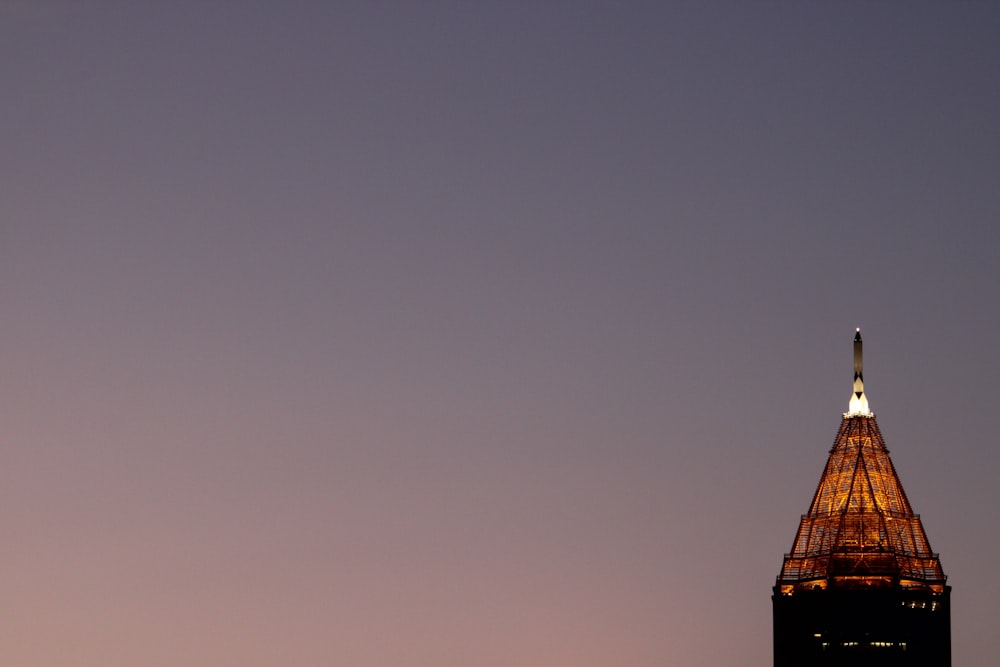 a very tall building with a clock at the top