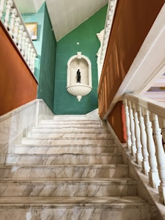 Before and after shot of a scratched marble staircase restored to smooth perfection