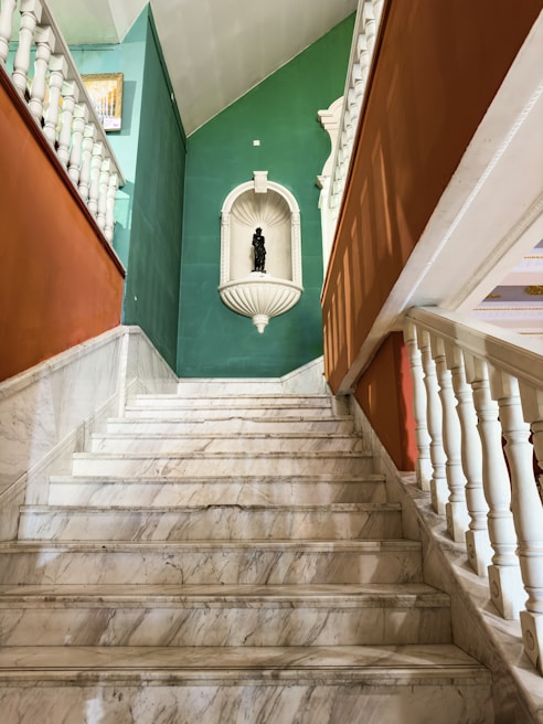 Before and after shot of a scratched marble staircase restored to smooth perfection