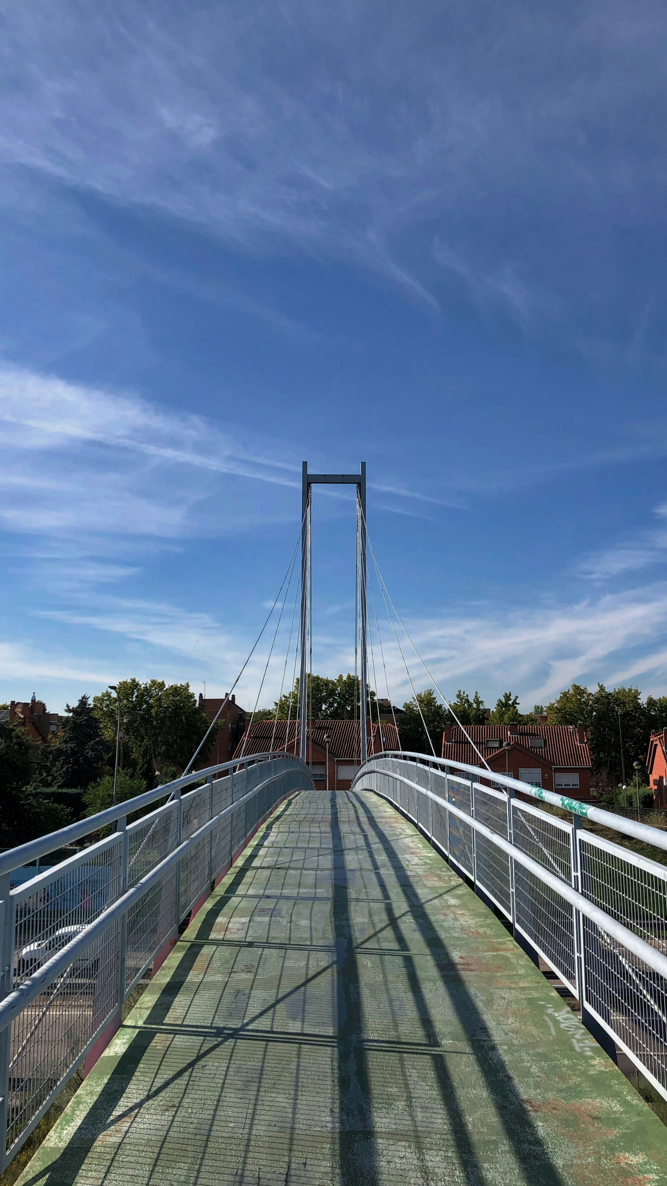 a view of a bridge with a sky background