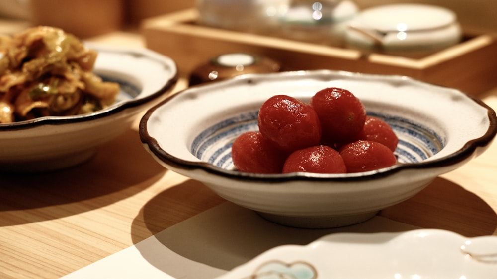 a close up of a bowl of food on a table