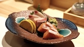 A beautifully arranged plate of sushi highlighting fresh ingredients and artistic presentation.