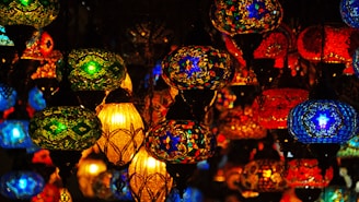 A vibrant display of various LED lanterns showcasing their unique designs.