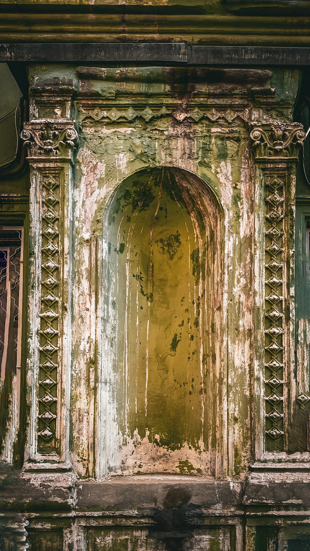 a very old building with a big door