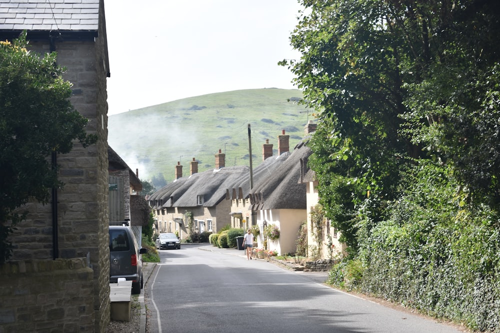 a street with a row of houses on the side of it