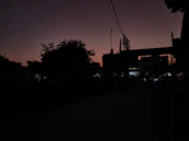 Musical notes blending into the silhouette of Cantareira hills at dusk.