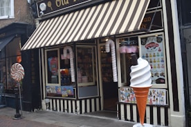 Smiling staff member ready to assist a customer at Candy Service Center
