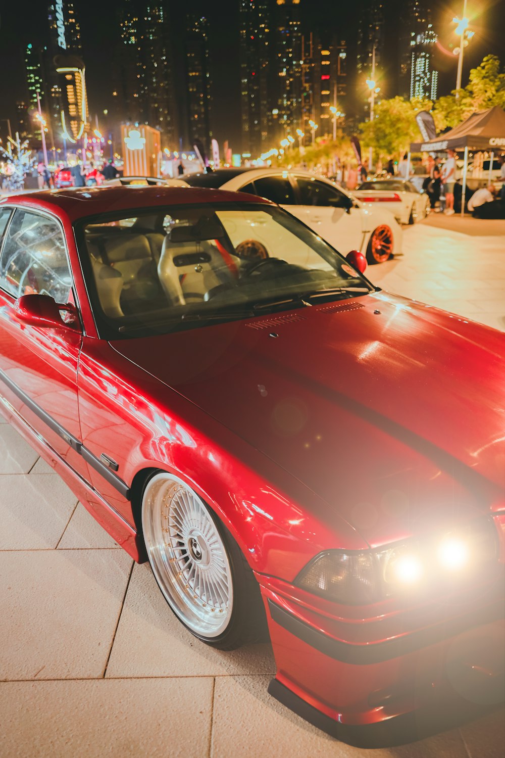 a red car parked on the side of the road