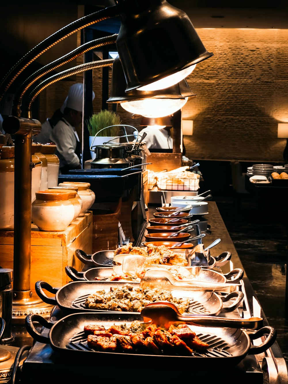 a buffet table with many plates of food on it