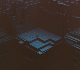 A dark, abstract digital landscape with layered, geometric structures resembling a futuristic, industrial complex. The scene gives a sense of depth and complexity, with varying levels of platforms and shadowy areas.
