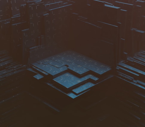A dark, abstract digital landscape with layered, geometric structures resembling a futuristic, industrial complex. The scene gives a sense of depth and complexity, with varying levels of platforms and shadowy areas.