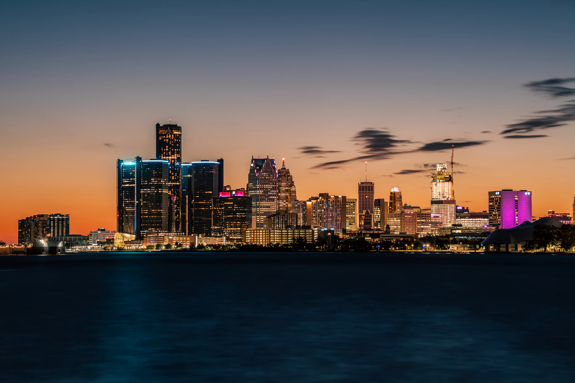 Detroit skyline at dusk across the river