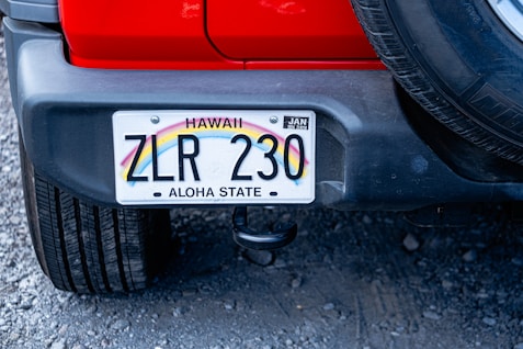 a close up of a license plate on a car