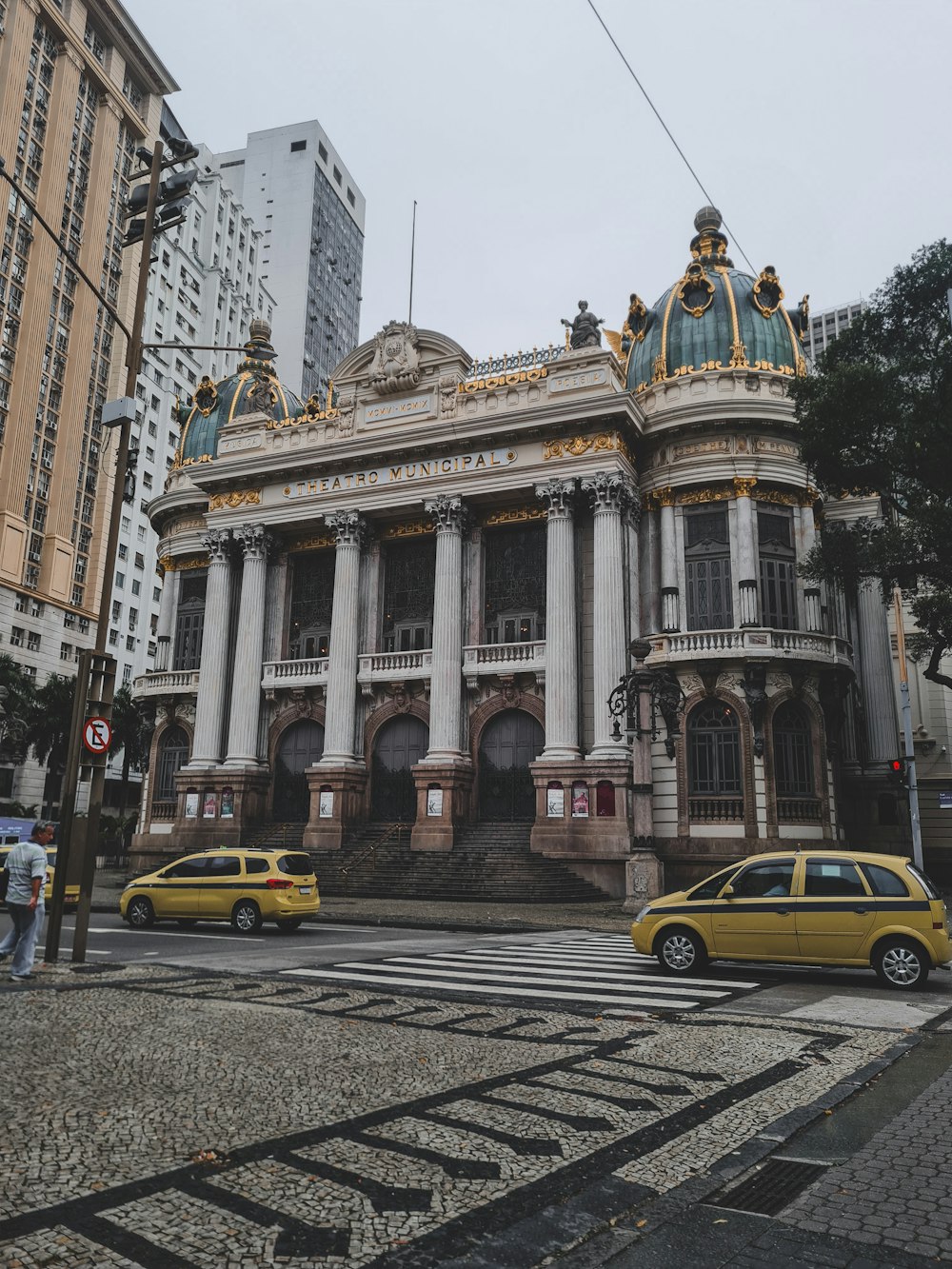 a large building with columns on the top of it