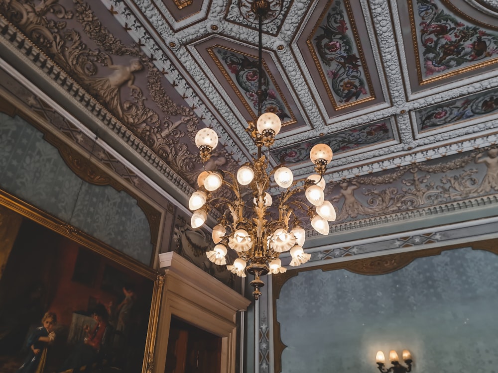 a chandelier hanging from the ceiling of a room