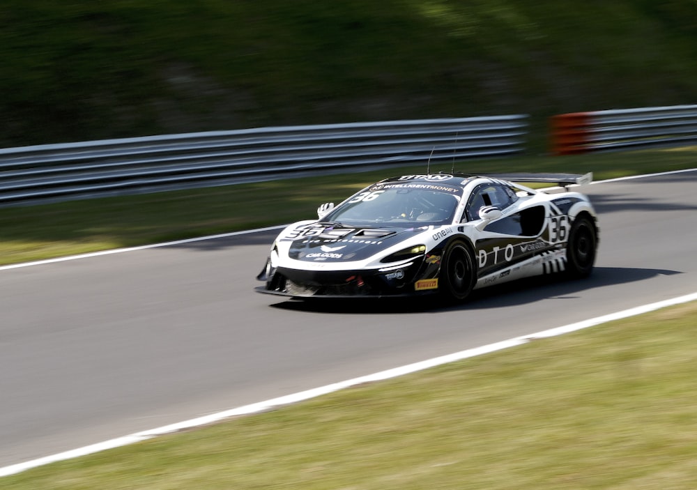 a race car driving down a race track