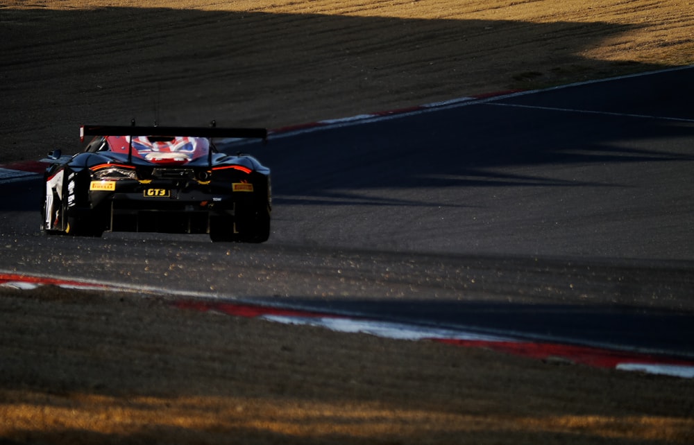 a race car driving down a race track