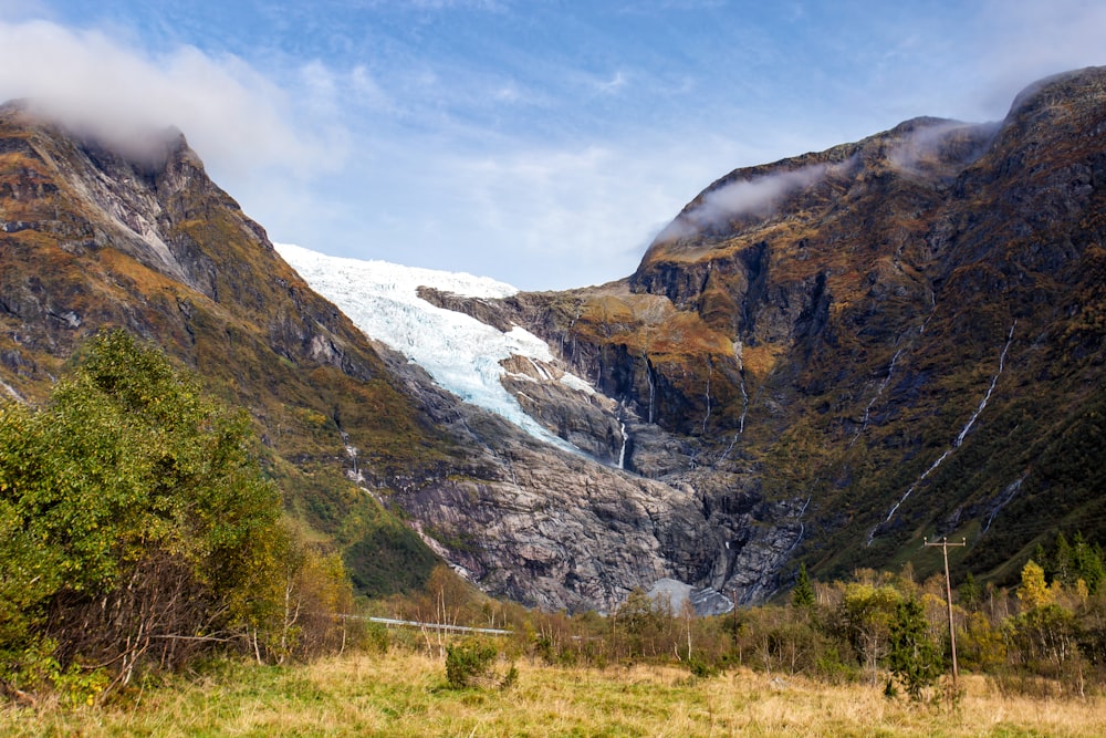 a view of a mountain with snow on it