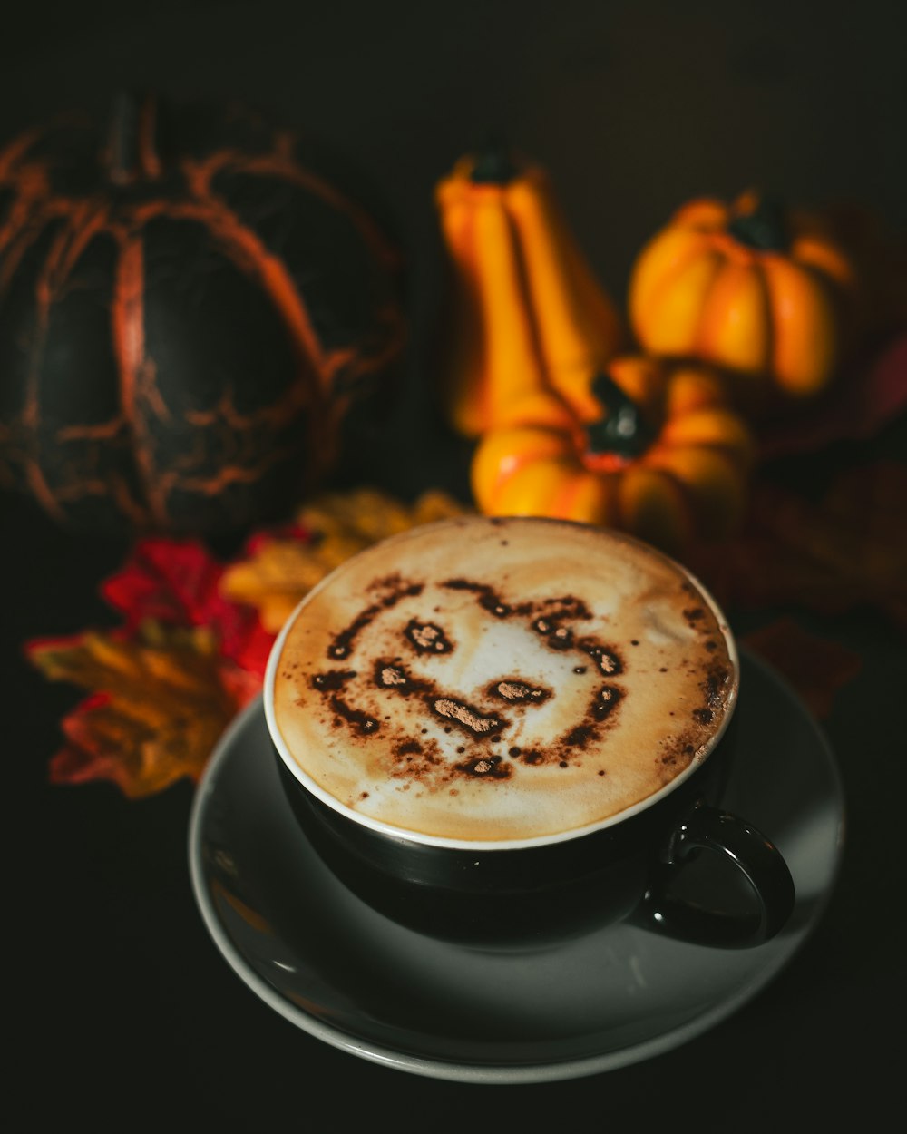 a cappuccino with a smiley face drawn on it