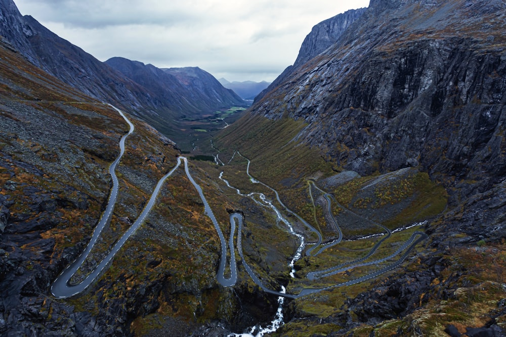 an aerial view of a winding mountain road