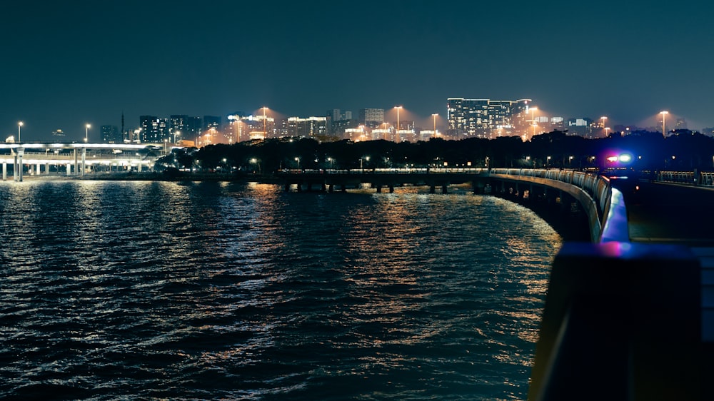 a view of a city at night from across the water