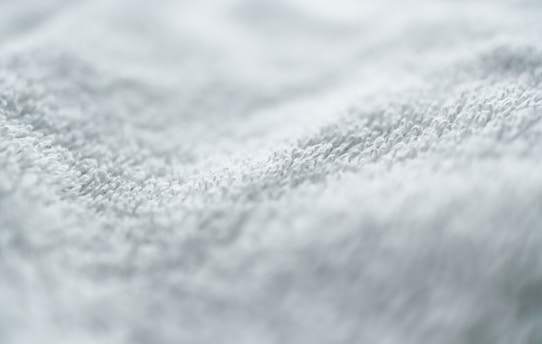 Close-up of a soft, high-quality cotton t-shirt fabric texture.