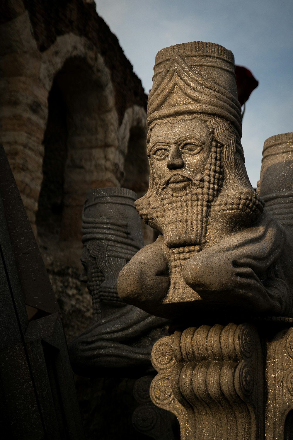 a statue of an old man with a beard