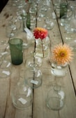 An assortment of uniquely shaped vases arranged on a table.