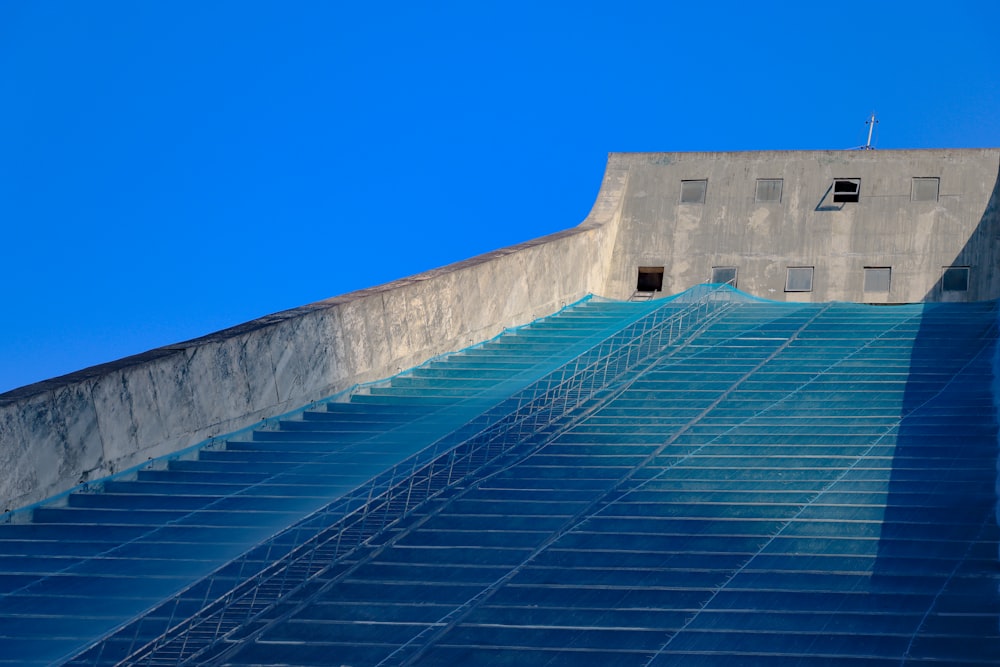 a very tall building with a very long stair case