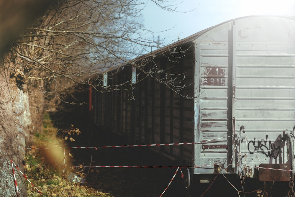 a train car with graffiti on the side of it