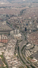 A vibrant aerial view of Hyderabad’s high-growth neighborhoods with marked property locations.