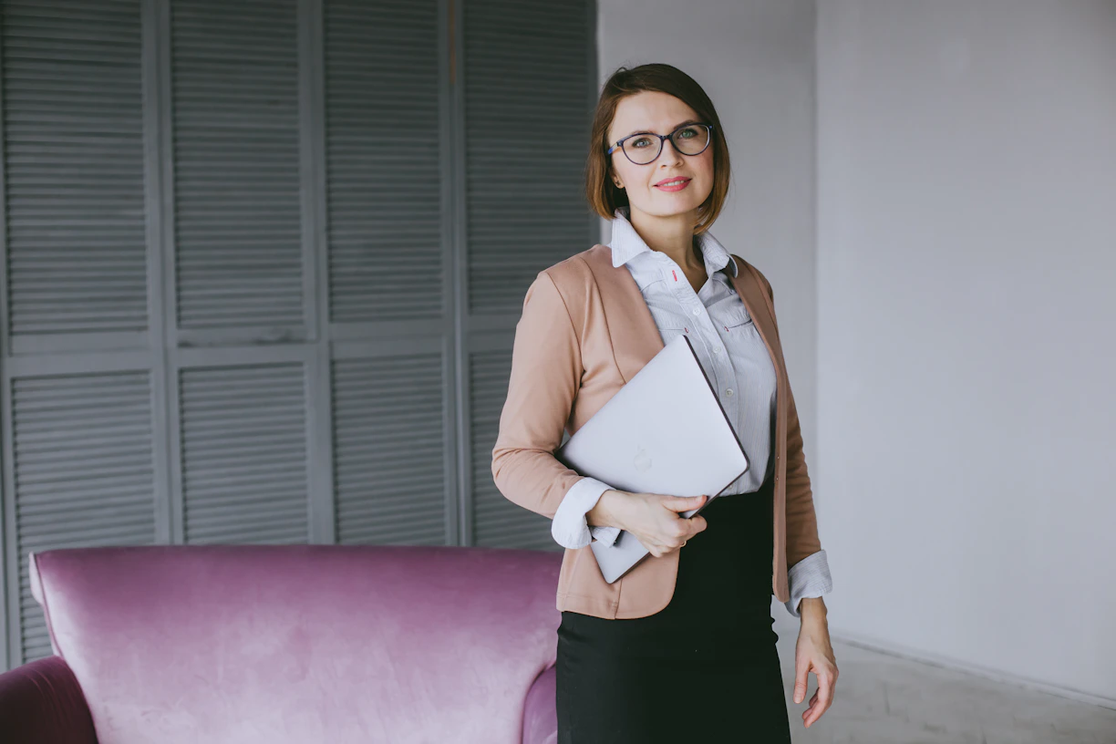 A professional consultant confidently closing a deal during a business meeting.